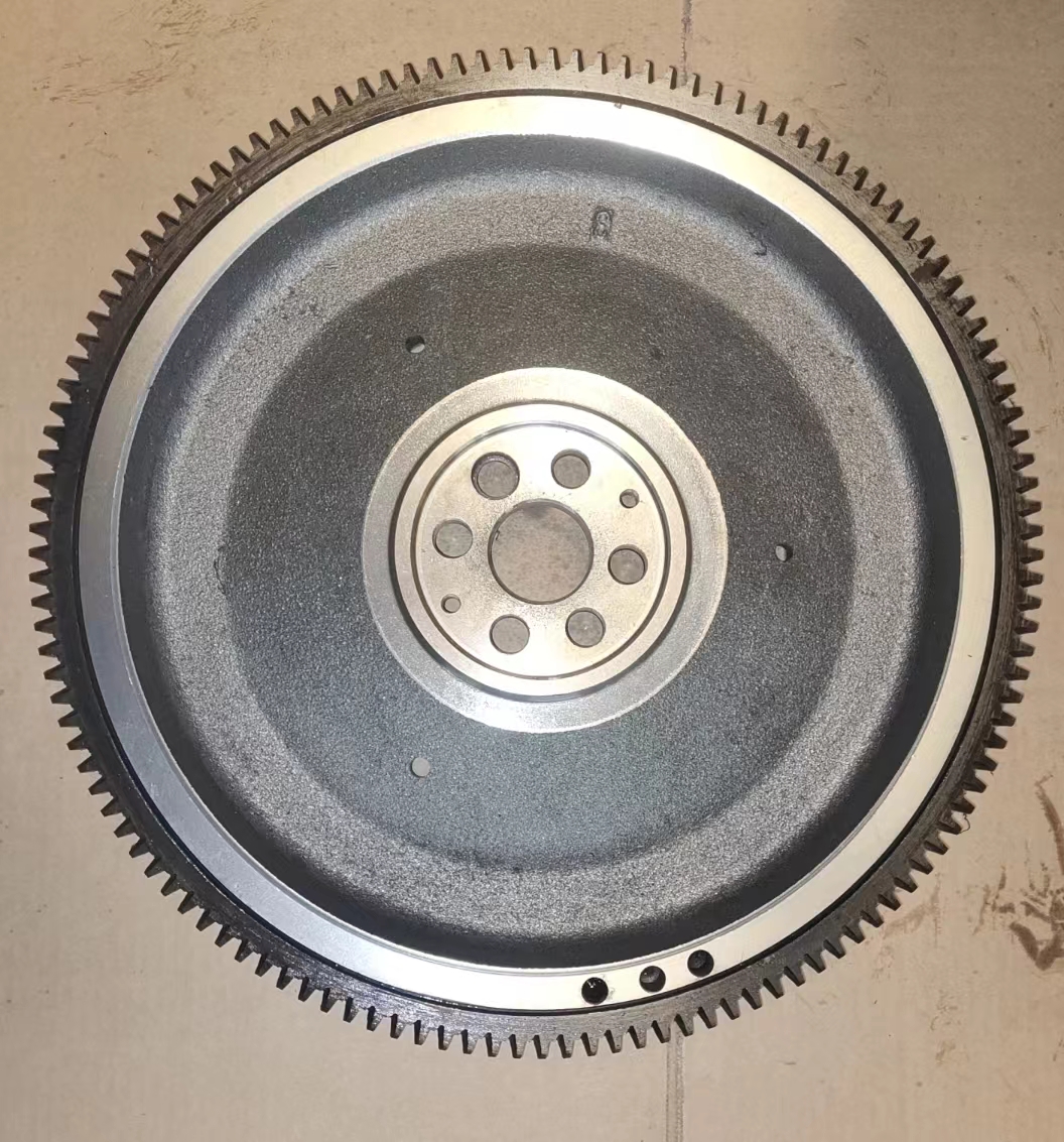 HINO EH700 F15-4 flywheel front view showing 129T ring gear