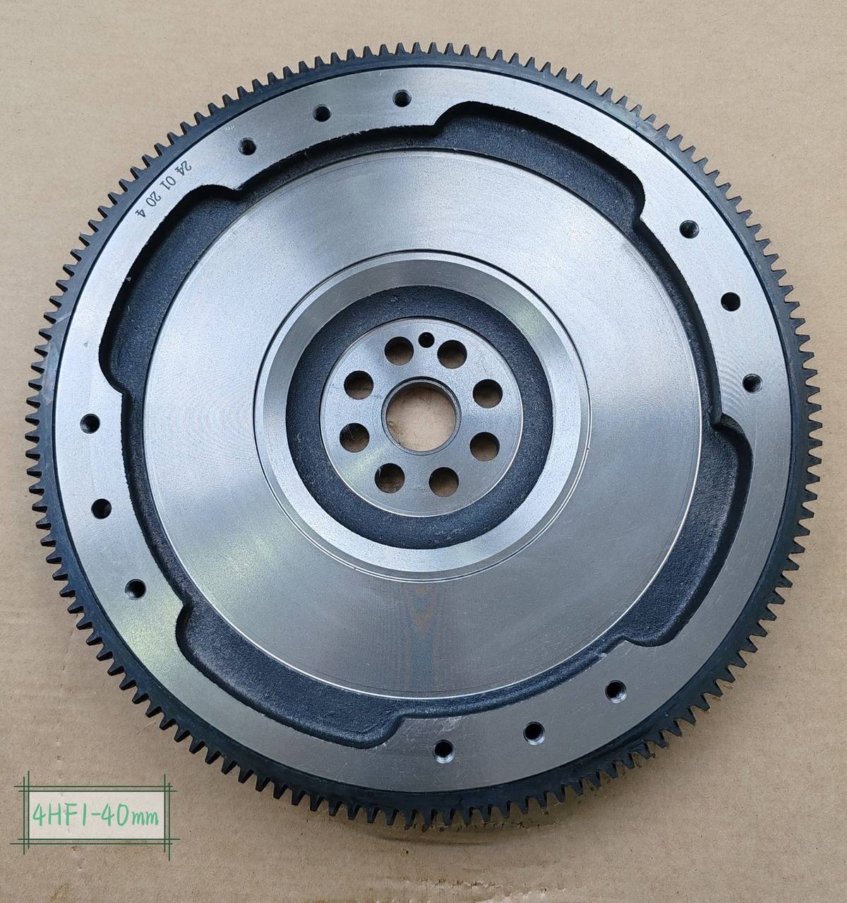 ISUZU 4HF1 flywheel 40 mm version, crank side showing the machined mounting flange
