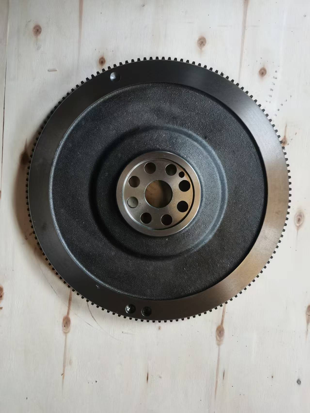 ISUZU 4HF1 S4 flywheel with raised centre hub and heavier ring gear teeth