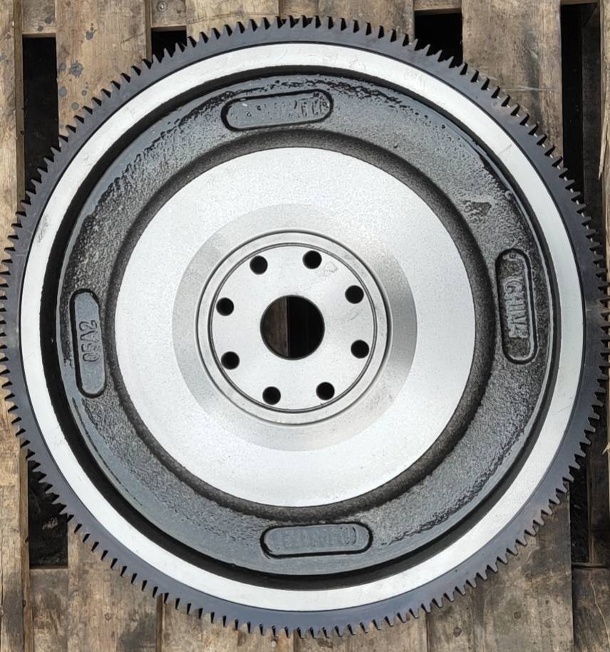Cummins 4981723 flywheel, front face, six hole crank flange with balance machining pockets in the friction web