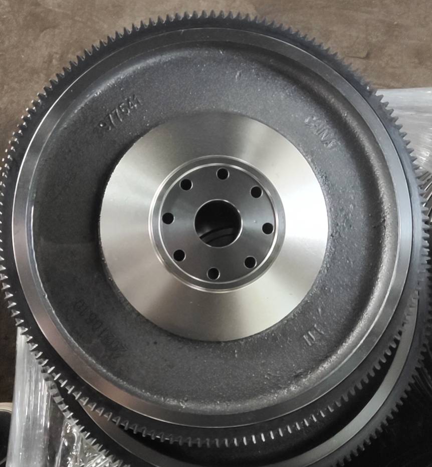 Cummins 540 flywheel, front face, machined centre hub with recessed friction band and coarse pitch ring gear