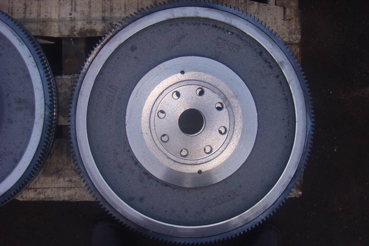 Cummins 6BT flywheel, front face, flat friction surface with drilled crank flange and fine pitch ring gear