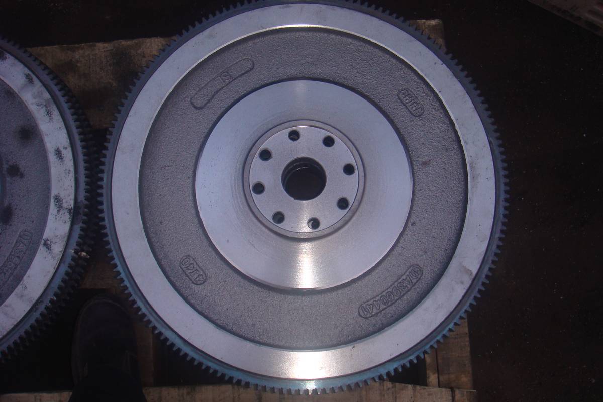 Cummins 6CT flywheel, front face, larger diameter casting with raised centre hub and machined friction ring