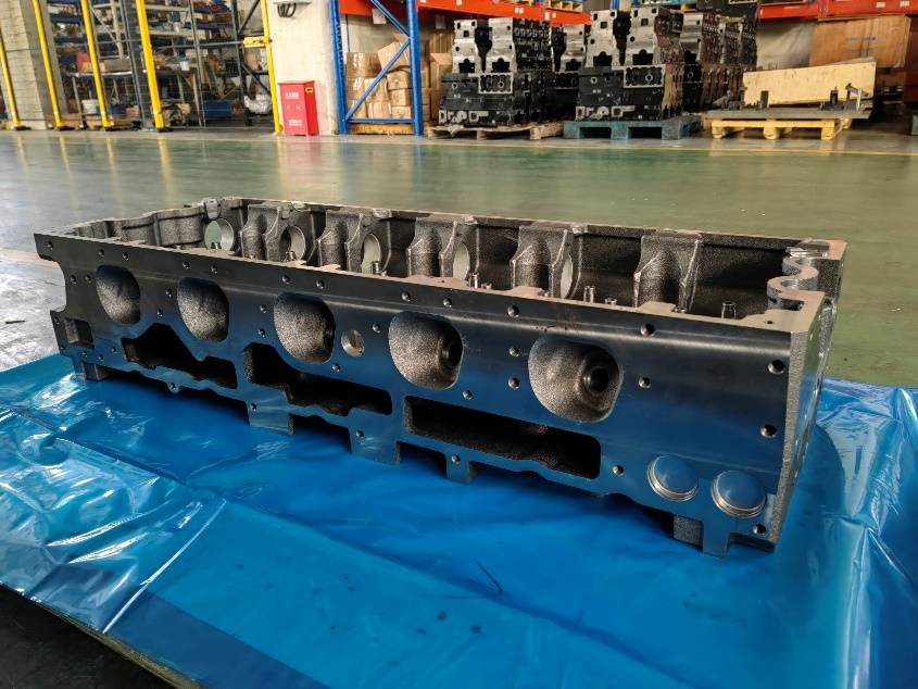 Cummins K-series cylinder head raw casting, combustion face, valve openings uncut