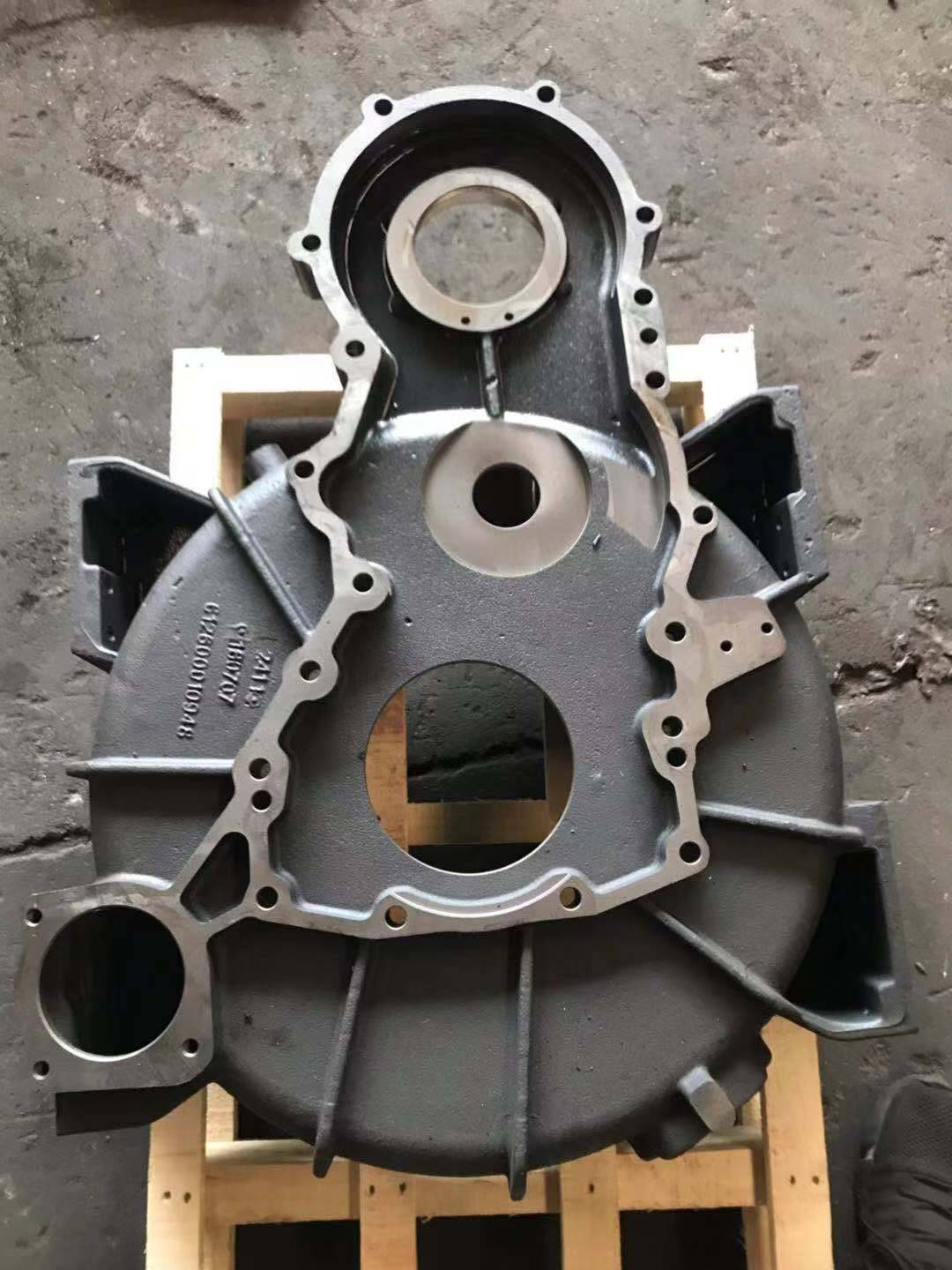 Centre drive flywheel housing configuration
