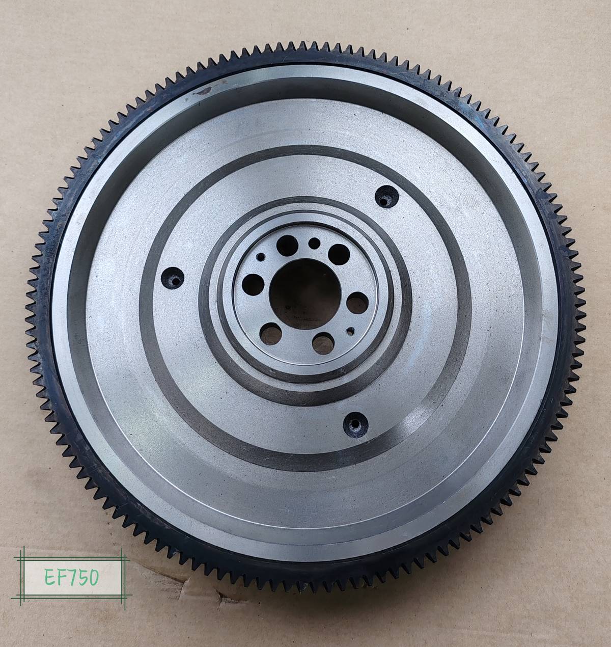 HINO EF750 flywheel, large coarse pitch ring gear and deeply recessed hub with raised boss