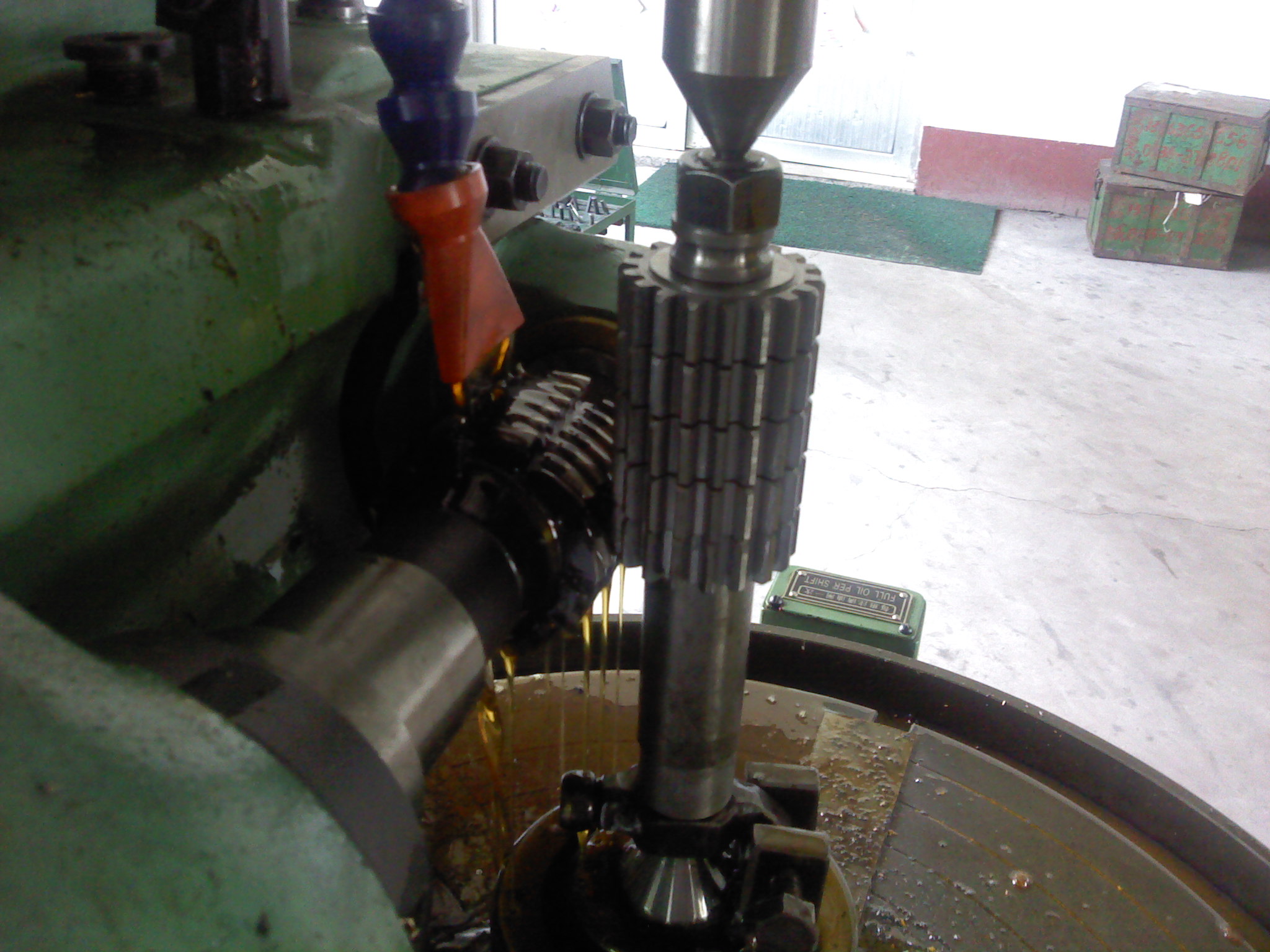 Hobbing machine cutting gear teeth on a ring gear blank with a rotating hob cutter
