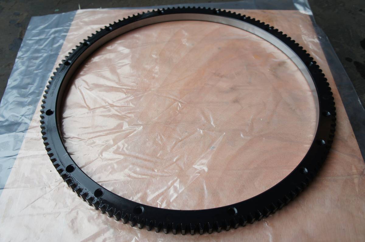 Large diameter ring gear with bolt holes on an internal flange